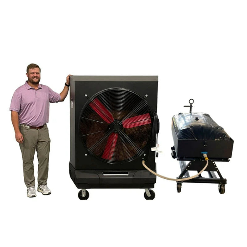 A man standing next to a PolarCool Pro 36 evaporative cooler with Water Cart attached.