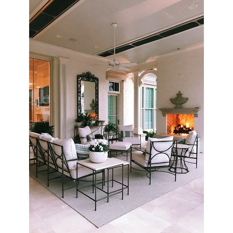 Detroit Radiant DSRL Gas Patio Heater recess mounted in the ceiling of a outdoor patio with furniture and a fireplace.