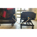 Black PolarCool Water Cart with wheels and bladder attached via hose to a PolarCool Pro 36 evaporative cooler on wheels.
